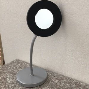 Modern and sleek circular vanity mirror!